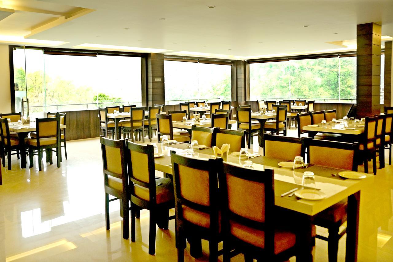 Hotel Trance Ganga Tapovan Bagian luar foto