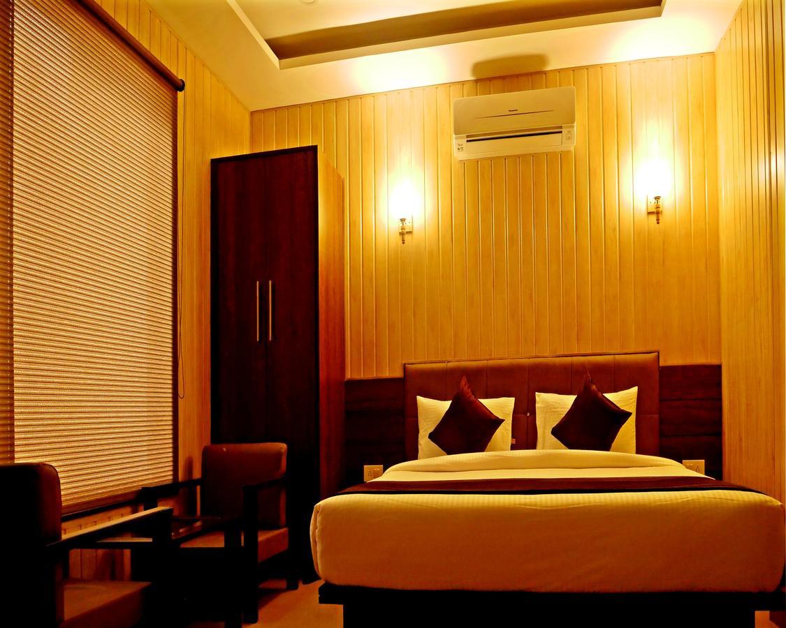 Hotel Trance Ganga Tapovan Bagian luar foto