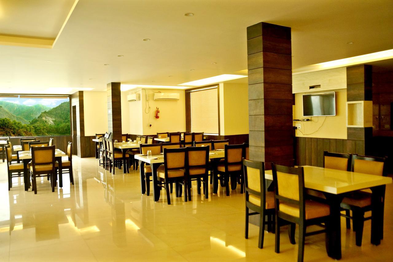 Hotel Trance Ganga Tapovan Bagian luar foto